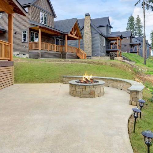 custom concrete patio with newly made firepit, for concrete patio construction in olathe ks
