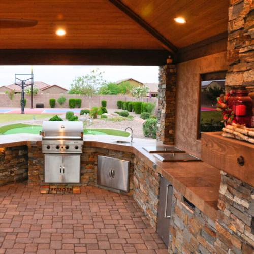 newly completed outdoor kitchen build with red brick and electric, for outdoor kitchen pergola and builder in olathe ks