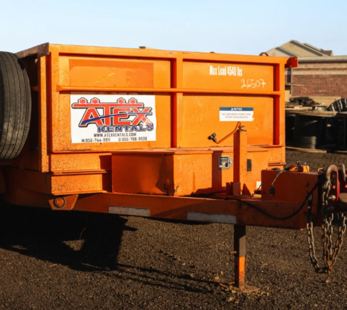 Orange dump trailer – ATEX Rentals equipment listing