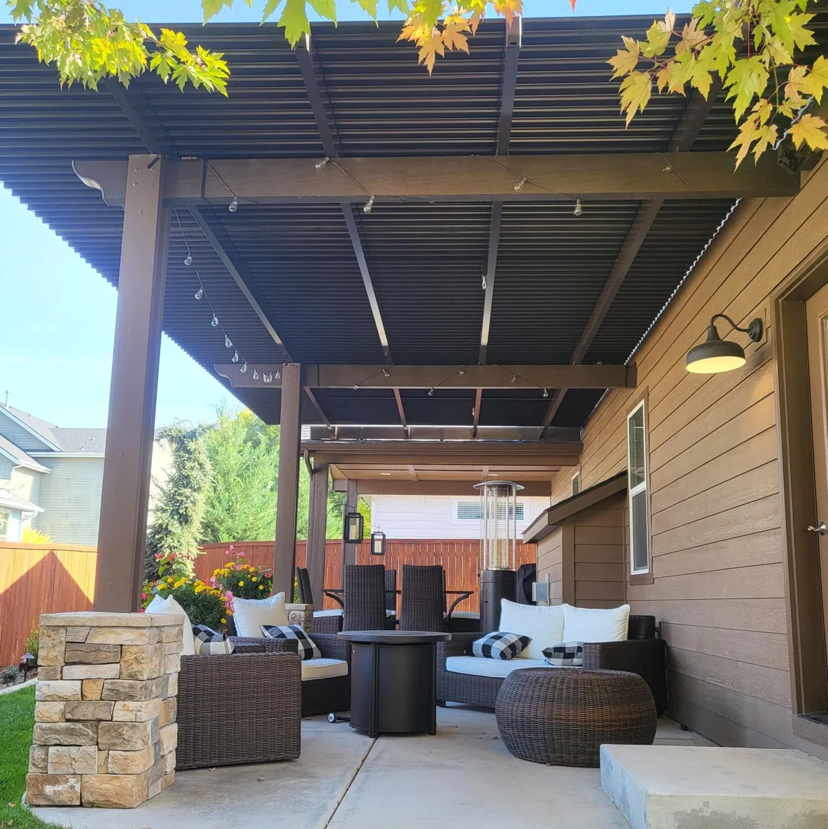 A patio covered in lots of chairs and tables