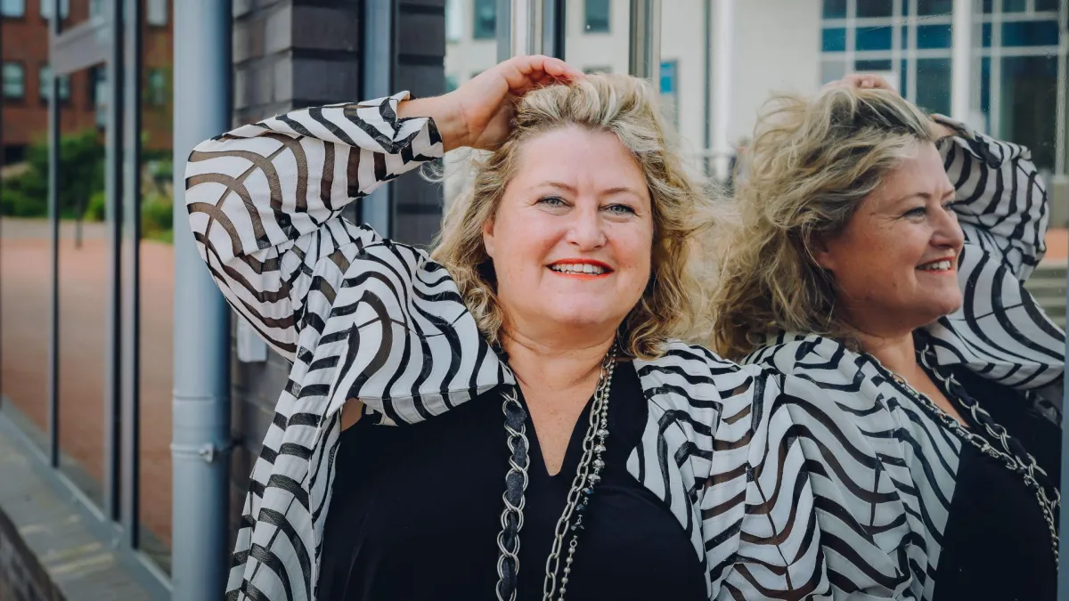 Birgit Gosejacob, AI rategist, eadshot with reflection