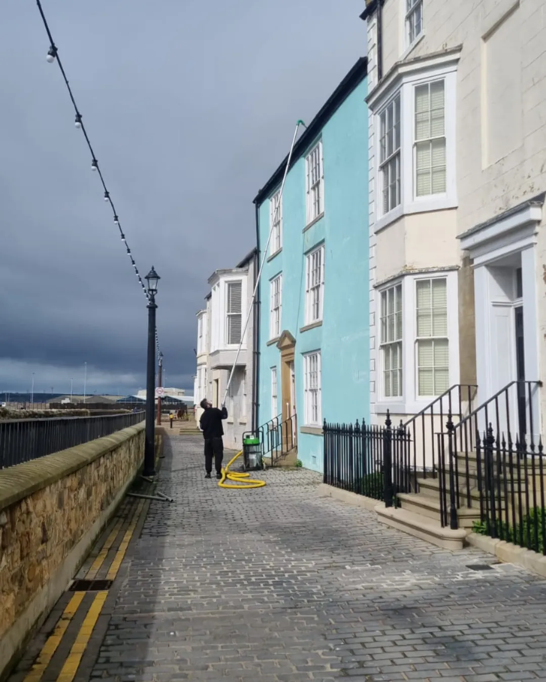 vh services vacuuming out a roof gutter