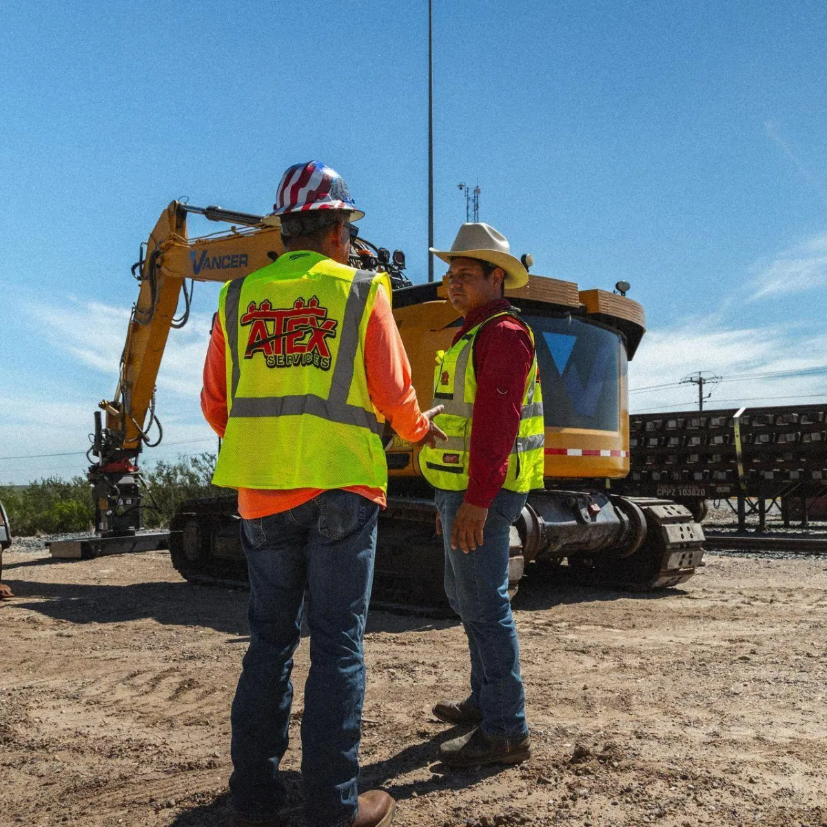ATEX Services construction team on-site with heavy equipment supporting commercial, civic, and institutional architecture projects across Texas and Colorado
