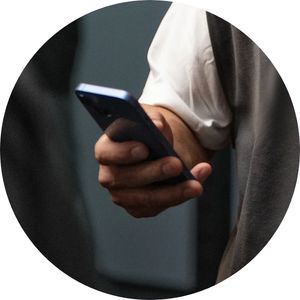 a hand using a smartphone