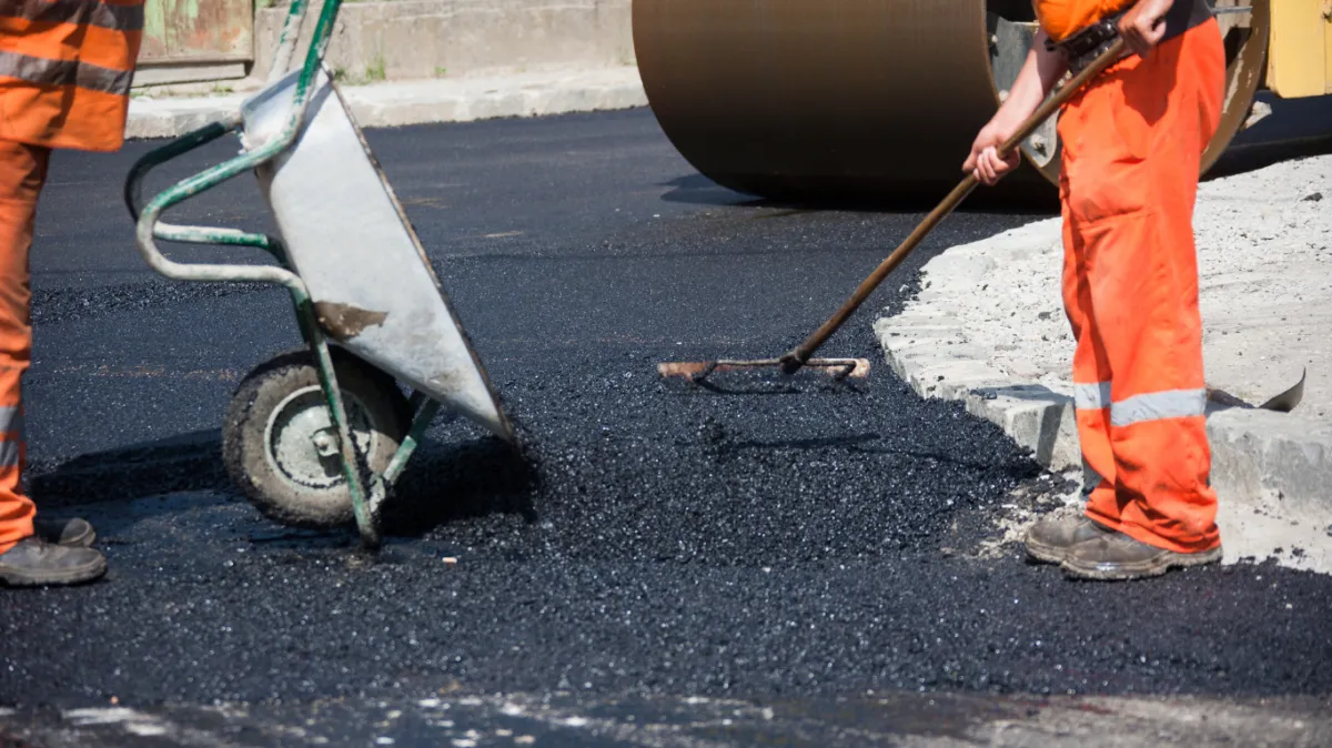 White Pine Asphalt & Paving Install asphalt in commercial Driveway