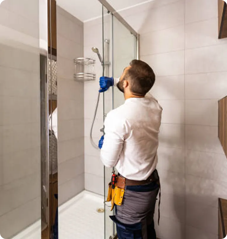 Before and after showing tub removal and new shower installation