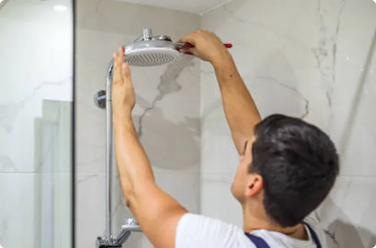 Accessible shower conversion with safety features and barrier-free entry for seniors