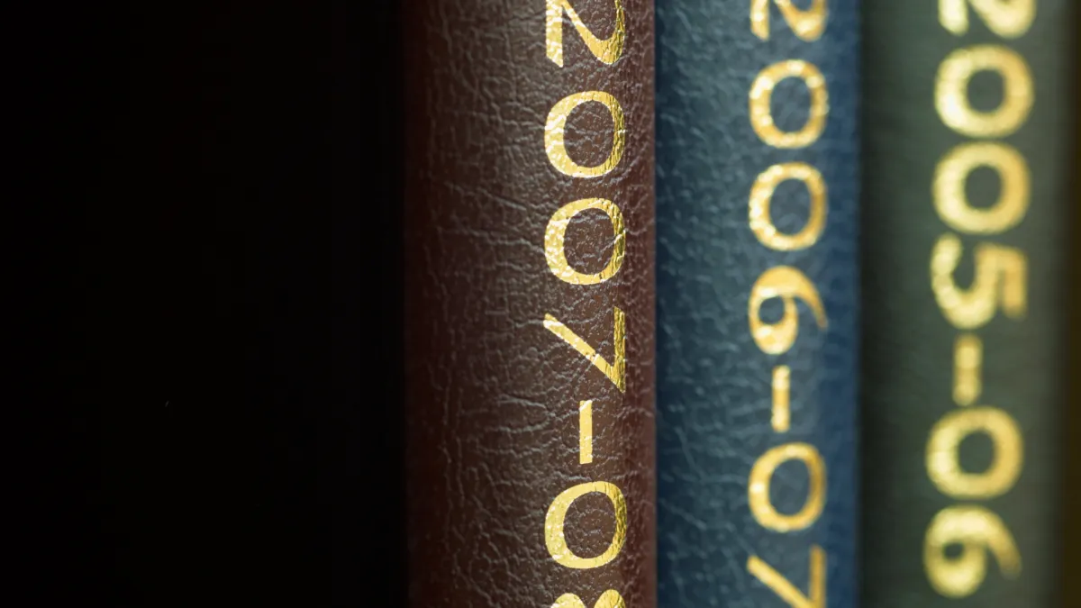 white, red, and black striped throw pillow