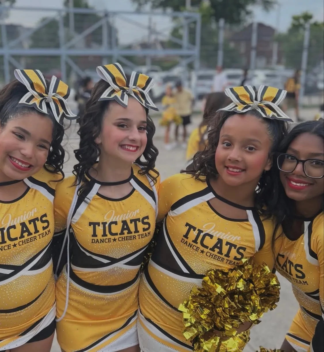 TICATS Junior Cheer Team performing dynamic choreography