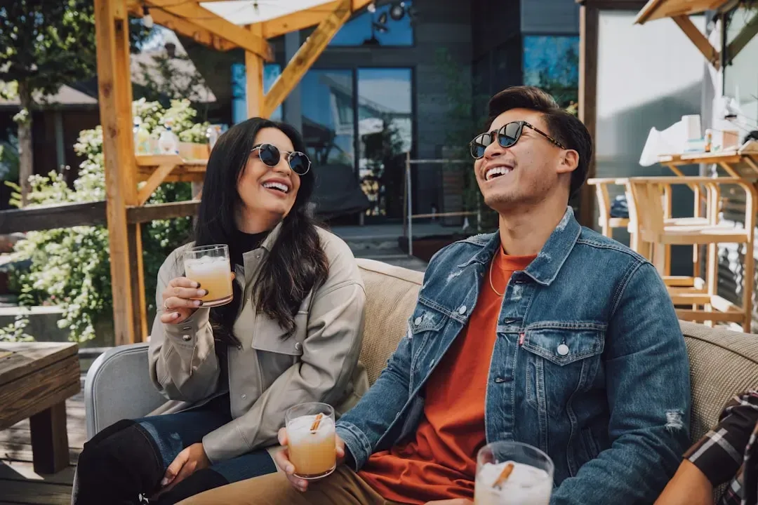 Couple enjoying a drink together at a cosy location