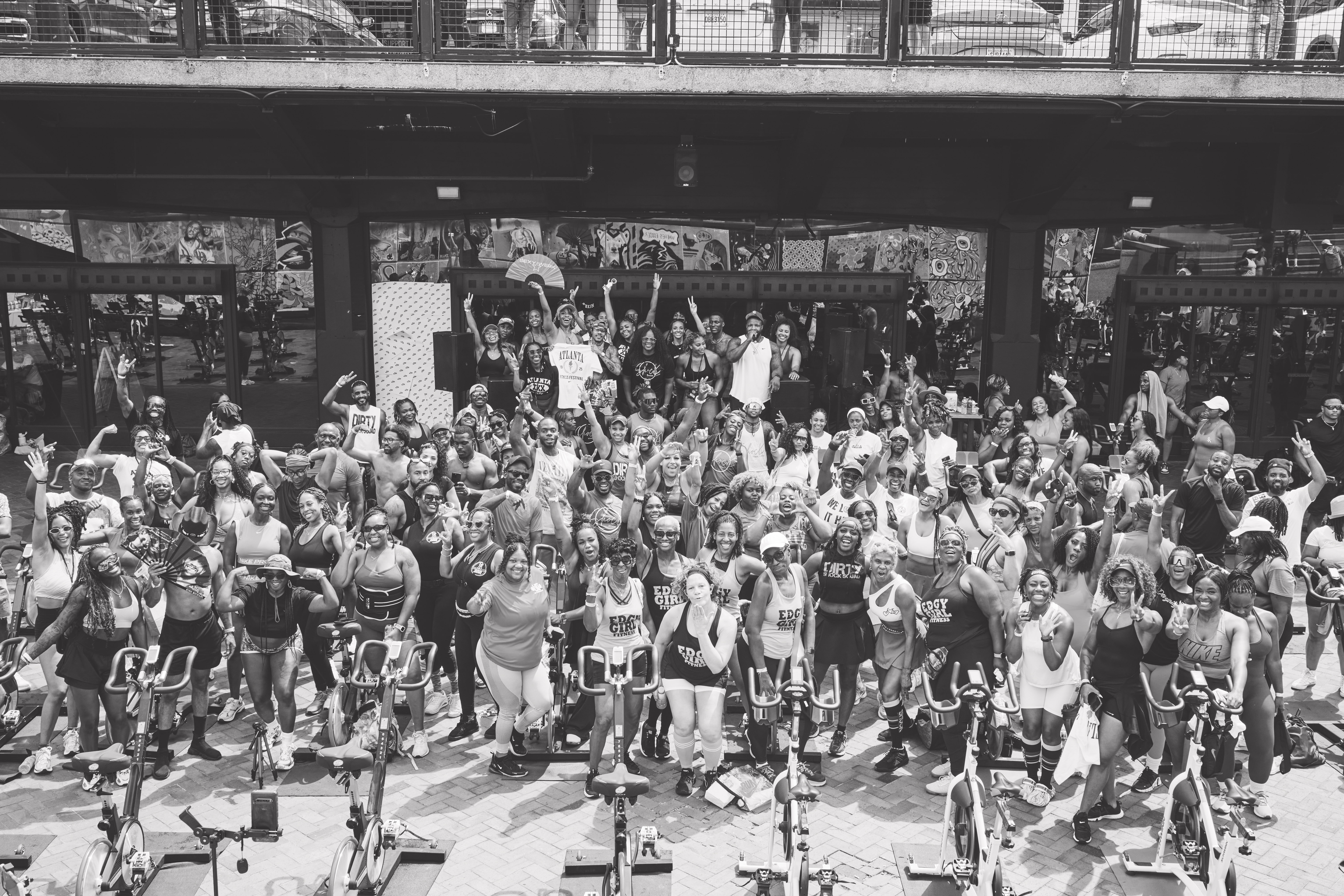 High-energy outdoor fitness festival crowd in Atlanta at sunset