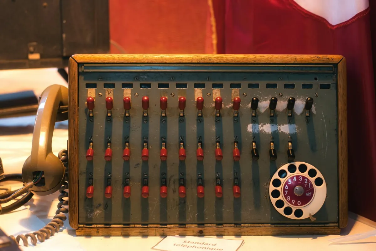 an old phone switchoard made obsolete by an AI phone receptionist