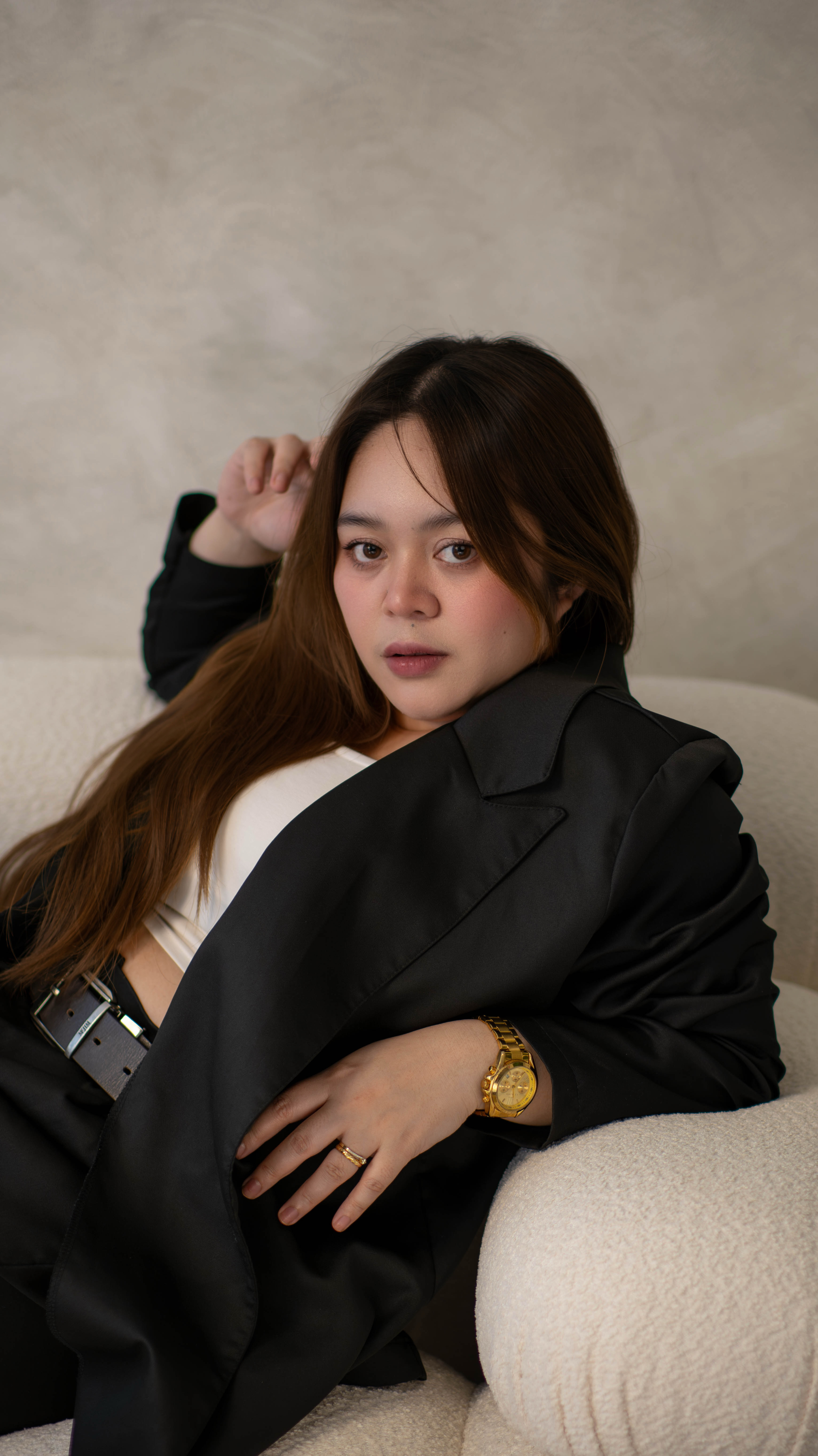 Photo of Vee in black suit