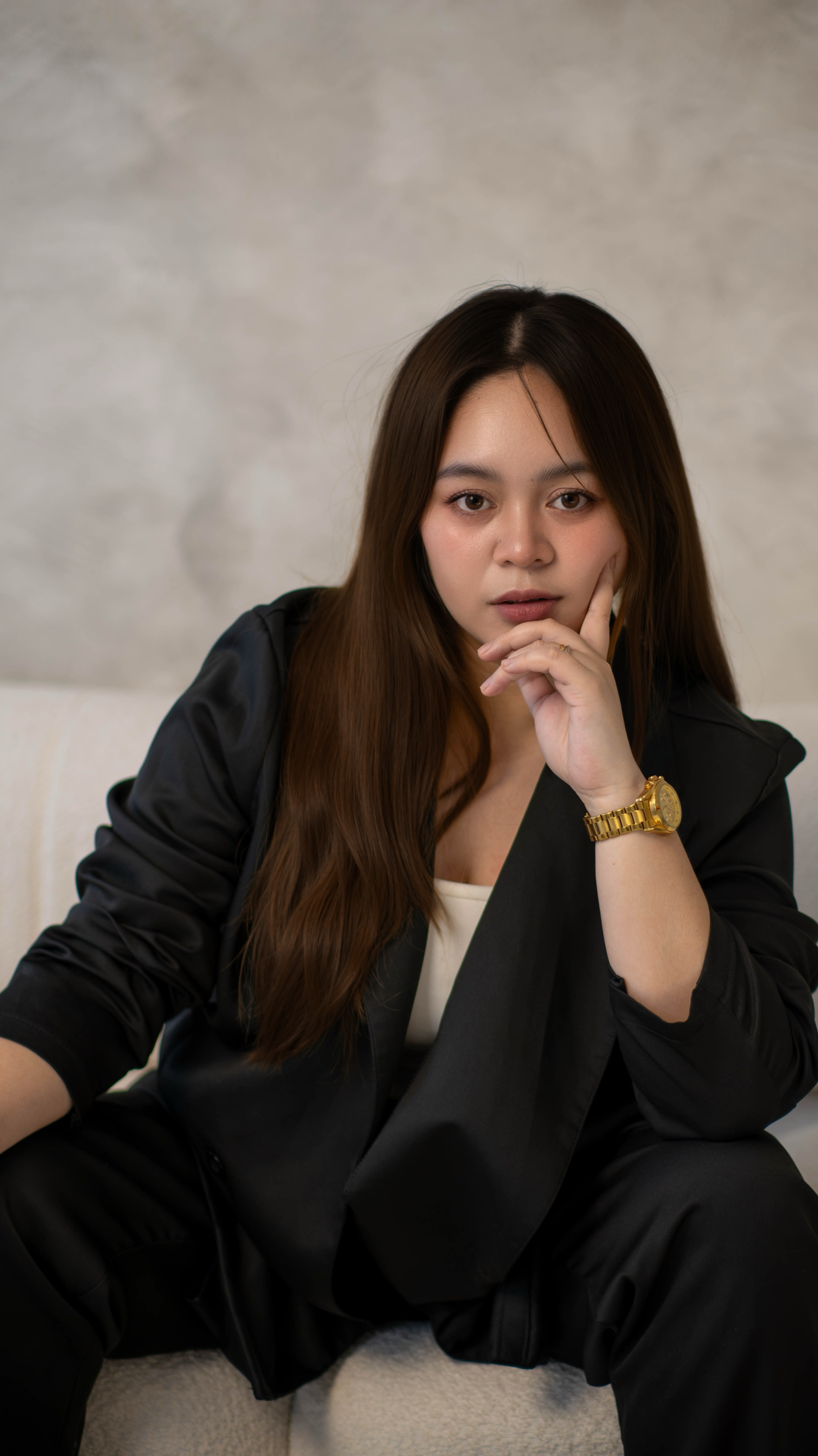 Photo of Vee in black suit