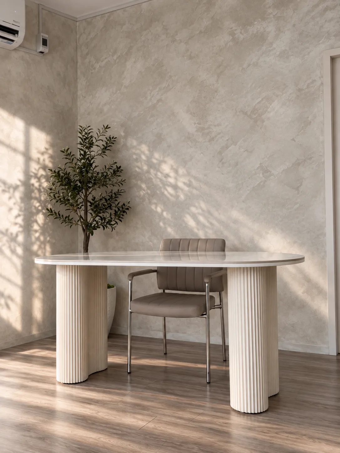 Photo of office table with aesthetic minimalist chair on limewash background