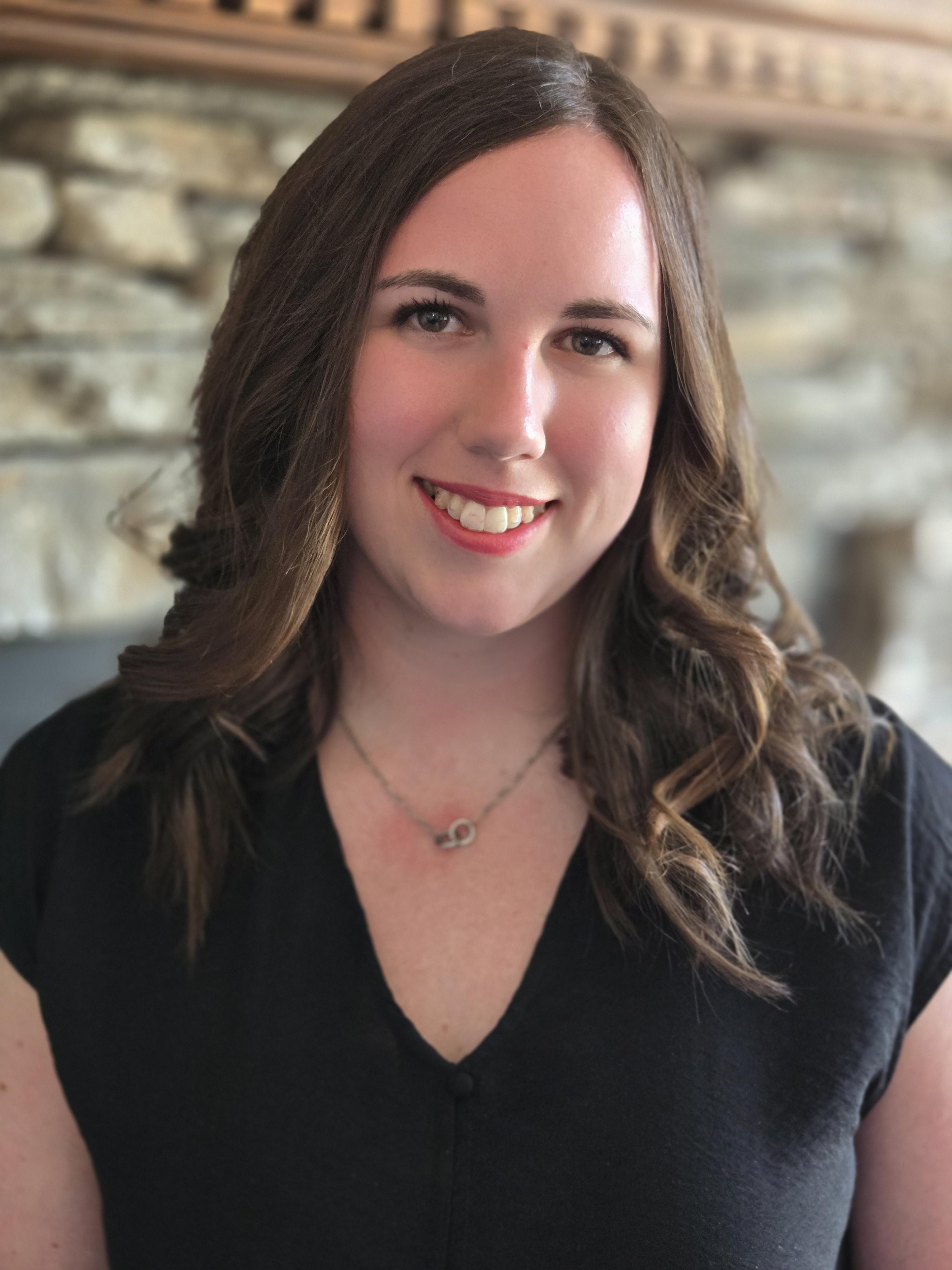 a living room filled with furniture and a painting on the wall