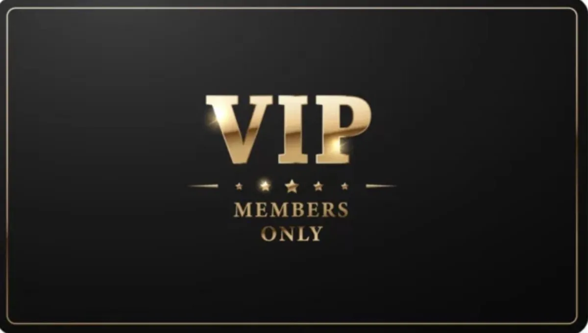 Two hands forming a heart shape against glass building