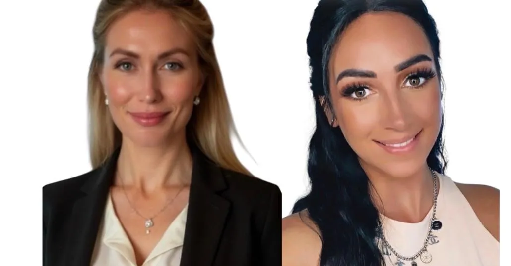 Shadows of two people making a heart shape.