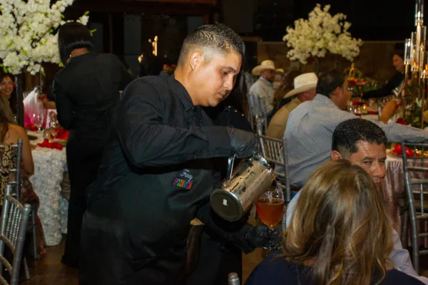 Fancy Fiesta professional wait staff serving drinks at a formal event in Midland, TX