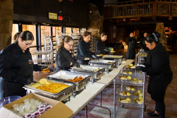 Fancy Fiesta line server staff preparing food at a corporate event in Midland, TX