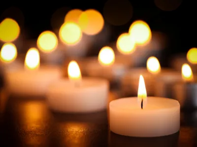 Fancy Fiesta event services for funerals, featuring candlelight memorial decor in Midland, TX