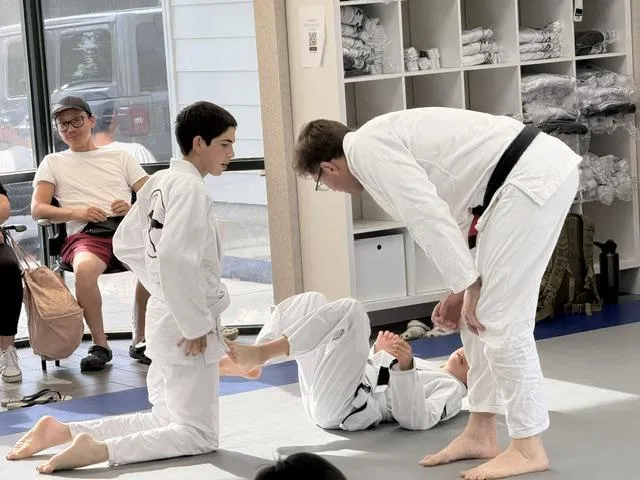 Kids jiu-jitsu with black belt instructor at PMA