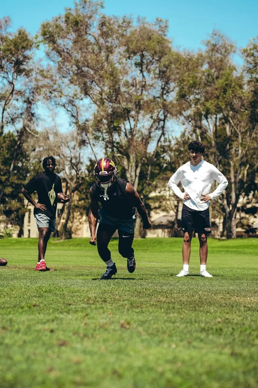 Washington Commanders player training with Dyland Bradley f WR1 Performance