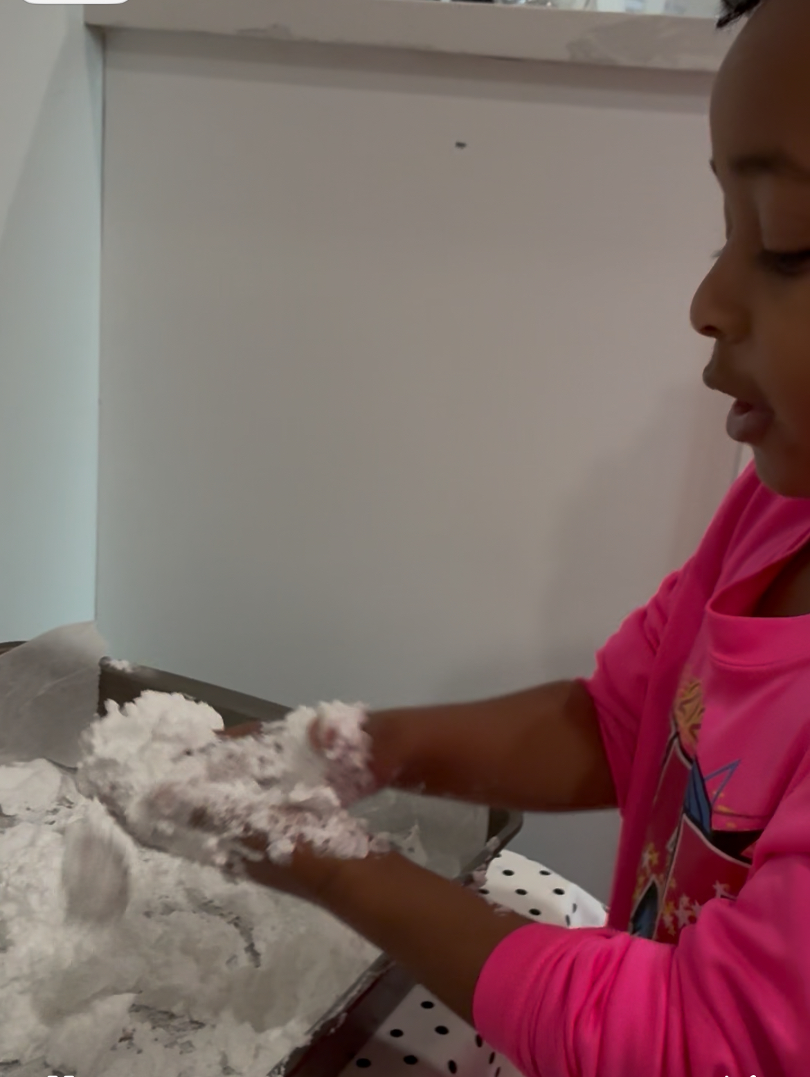 Girl watches a lesson about the alphabet on a laptop