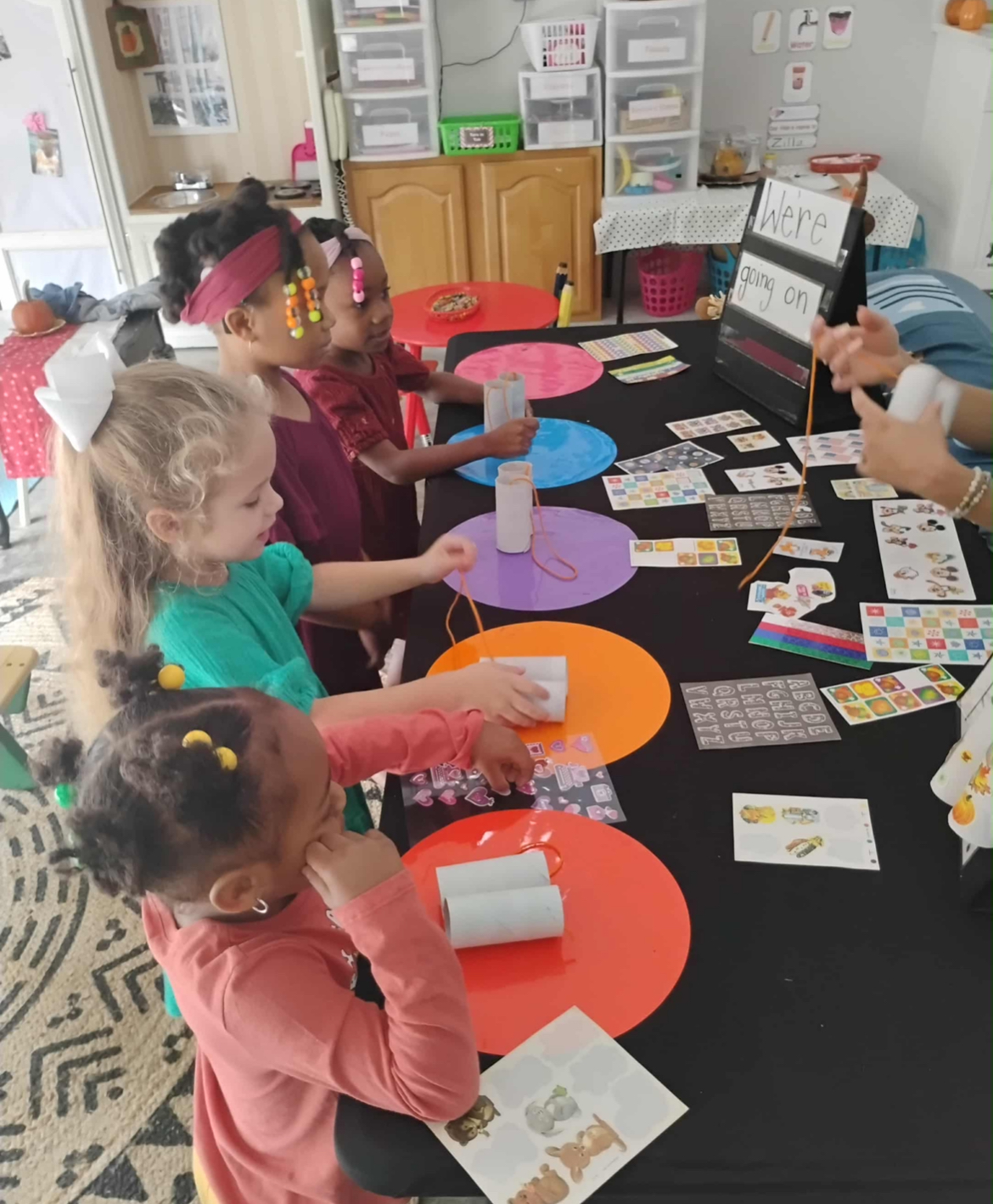 Girl follows directions during arts and crafts time.