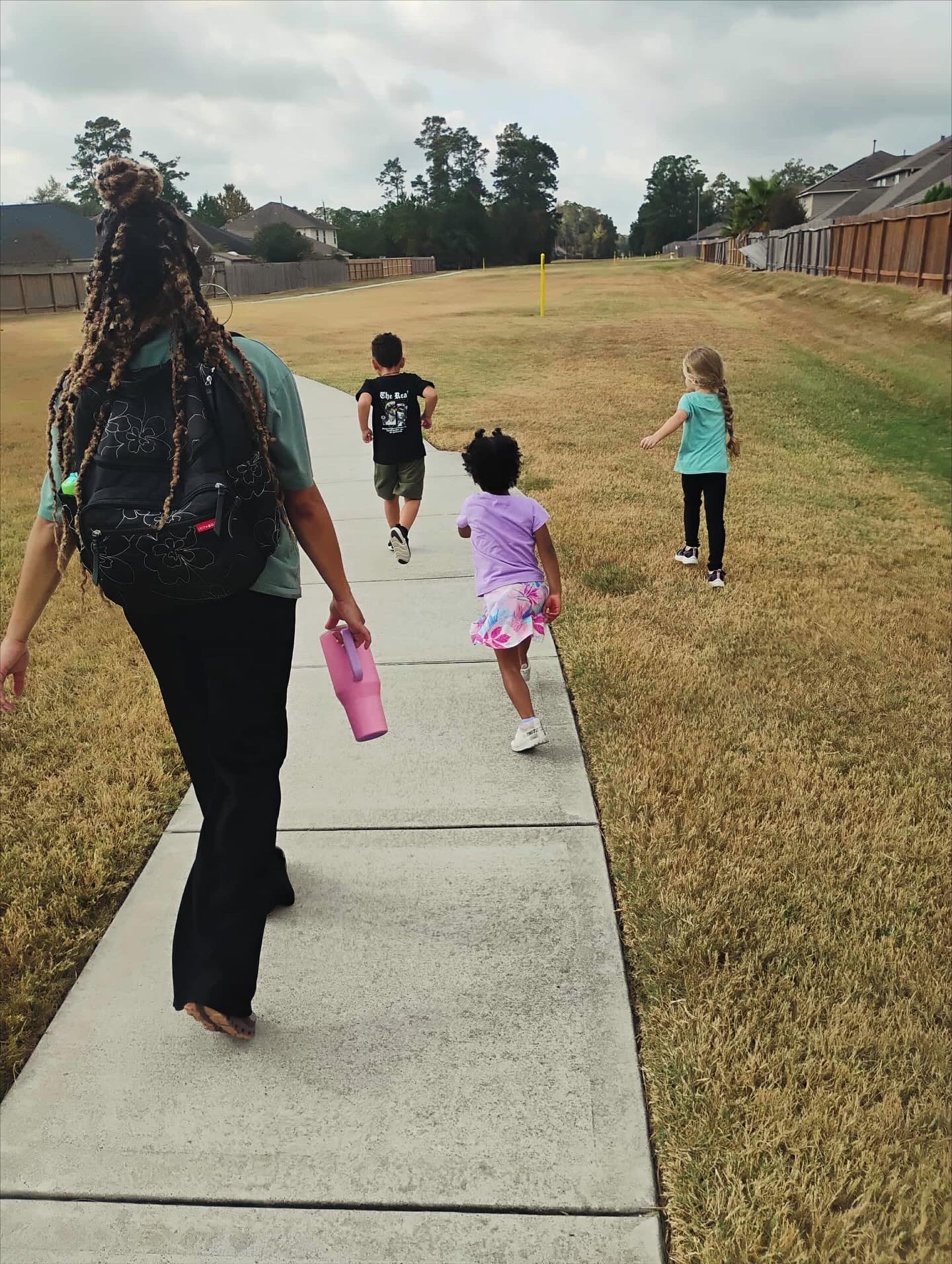 Girl watches a lesson about the alphabet on a laptop