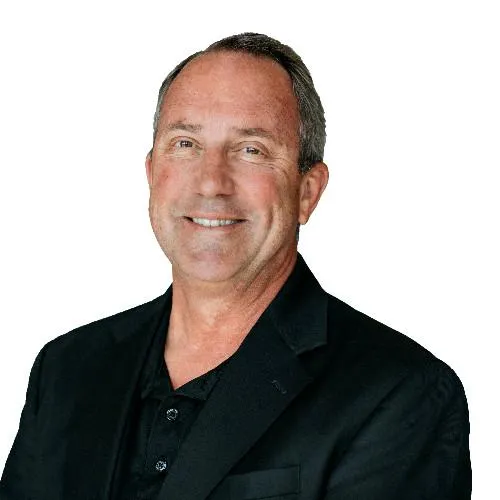 four people watching on white MacBook on top of glass-top table