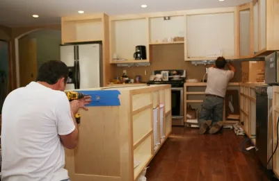 pic of 2 men remodeling kitchen