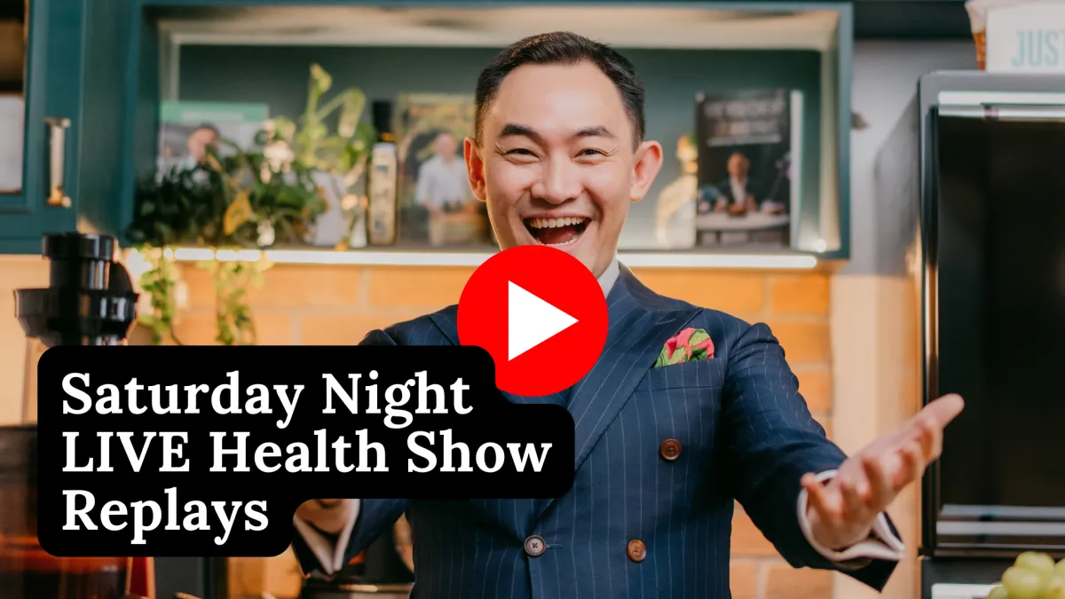 woman in white bathtub holding clear drinking glass