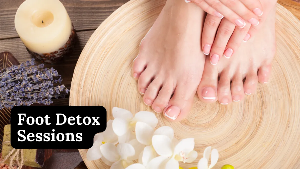 woman in white bathtub holding clear drinking glass