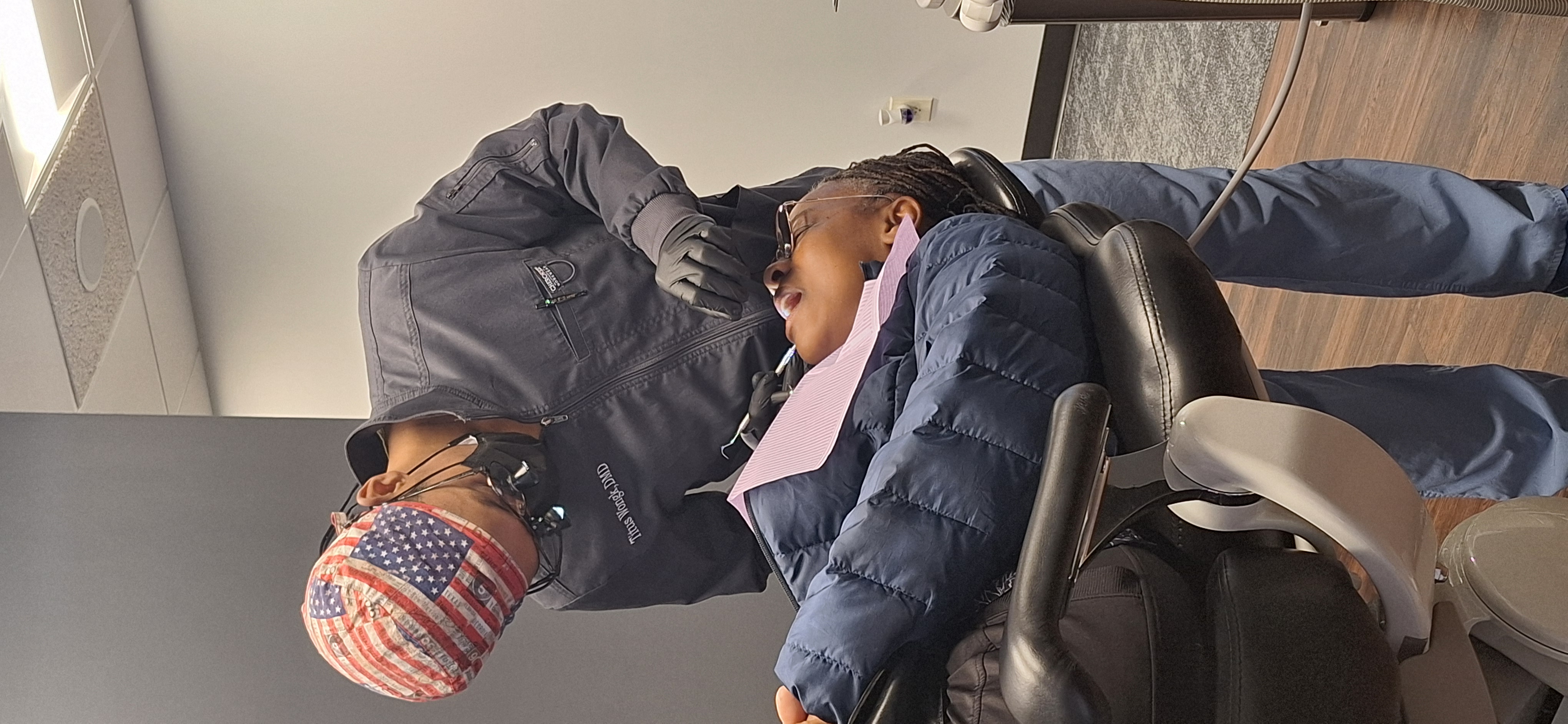 Dr. Titus Wongk treating a patient at Gwinnett Dental Studio