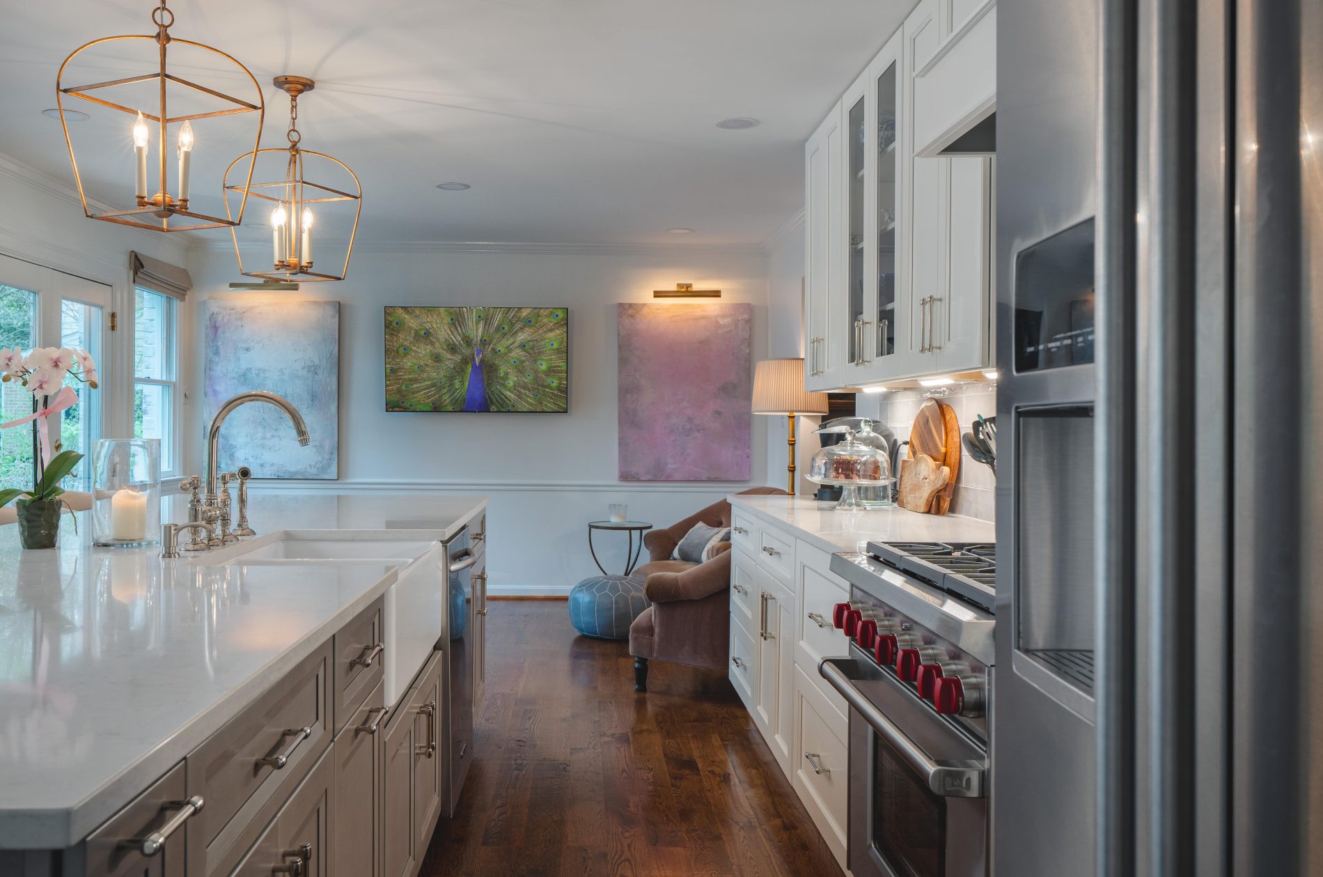 Alexandria Kitchen & Bath Remodel team designing an open-concept kitchen with elegant lighting and island seating