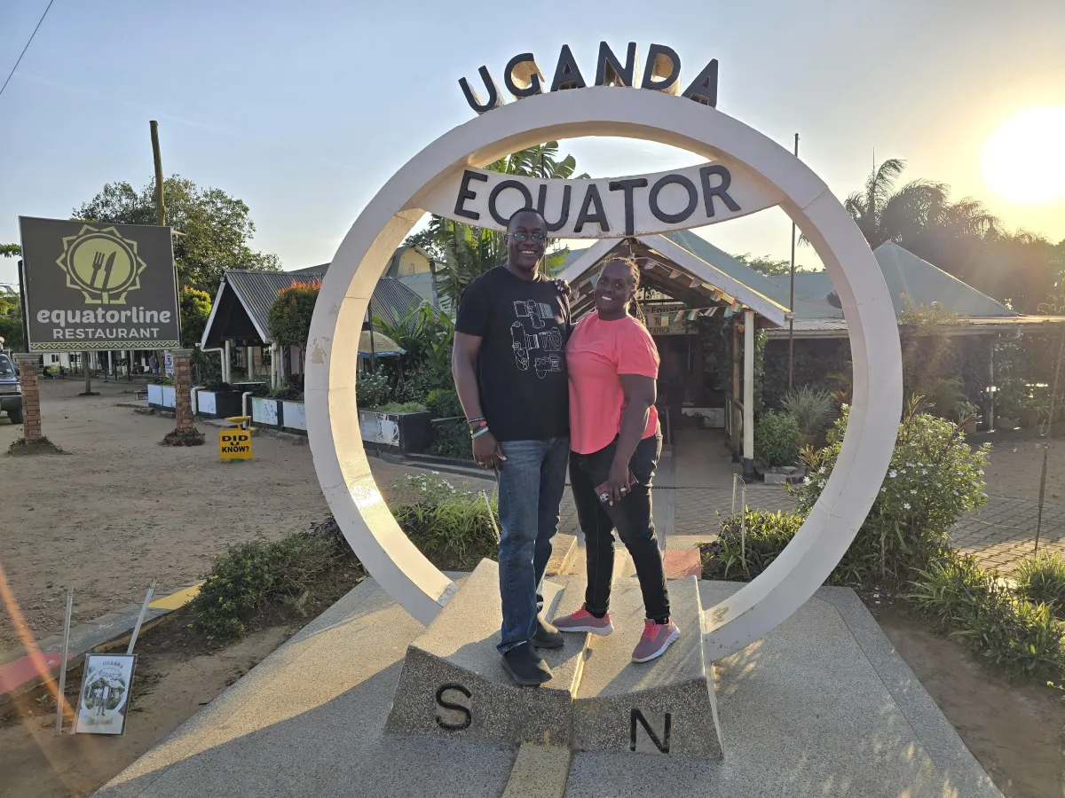 DPEdwards co-founders at the Uganda Equator tourist attraction