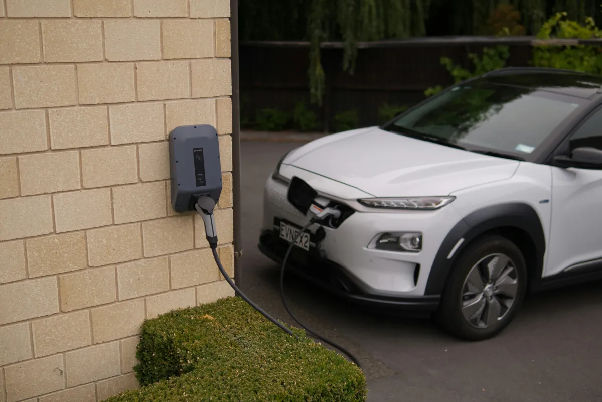 Electric vehicle charger installed in a residential garage.
