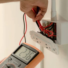 Electrician diagnosing an electrical problem.