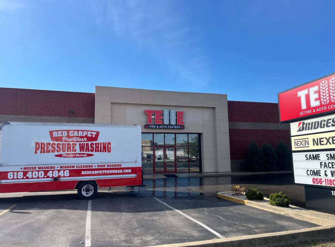 Residential pressure washing technician cleaning home exterior in Troy Edwardsville Illinois