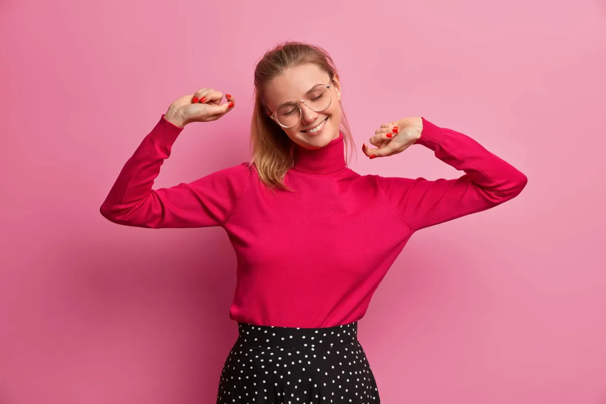 girl smiling wearing glasses