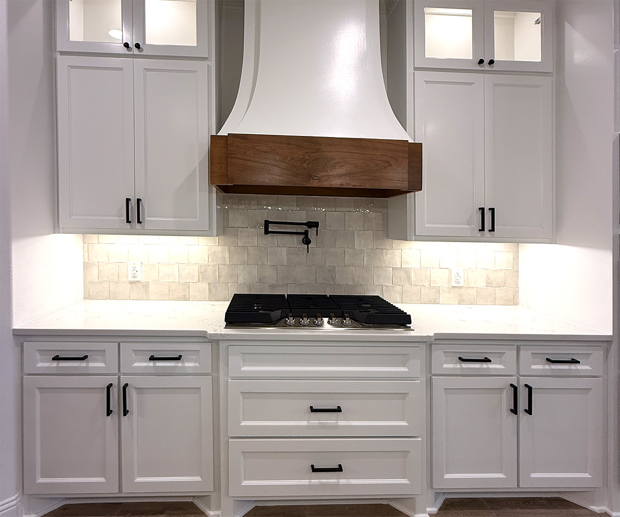 Professional interior painter working in a living room in Burleson TX