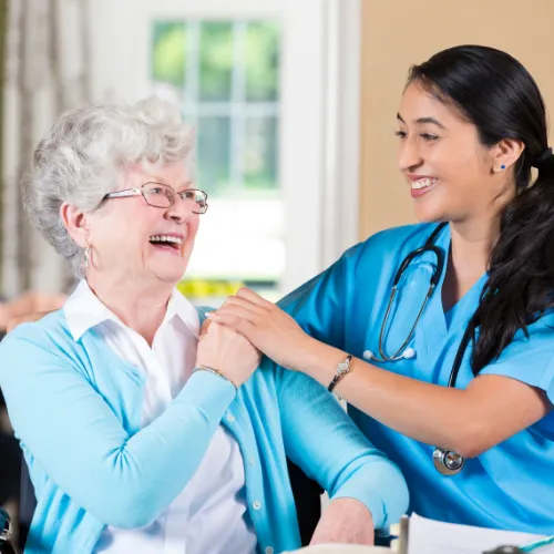 medical worker with elderly woman