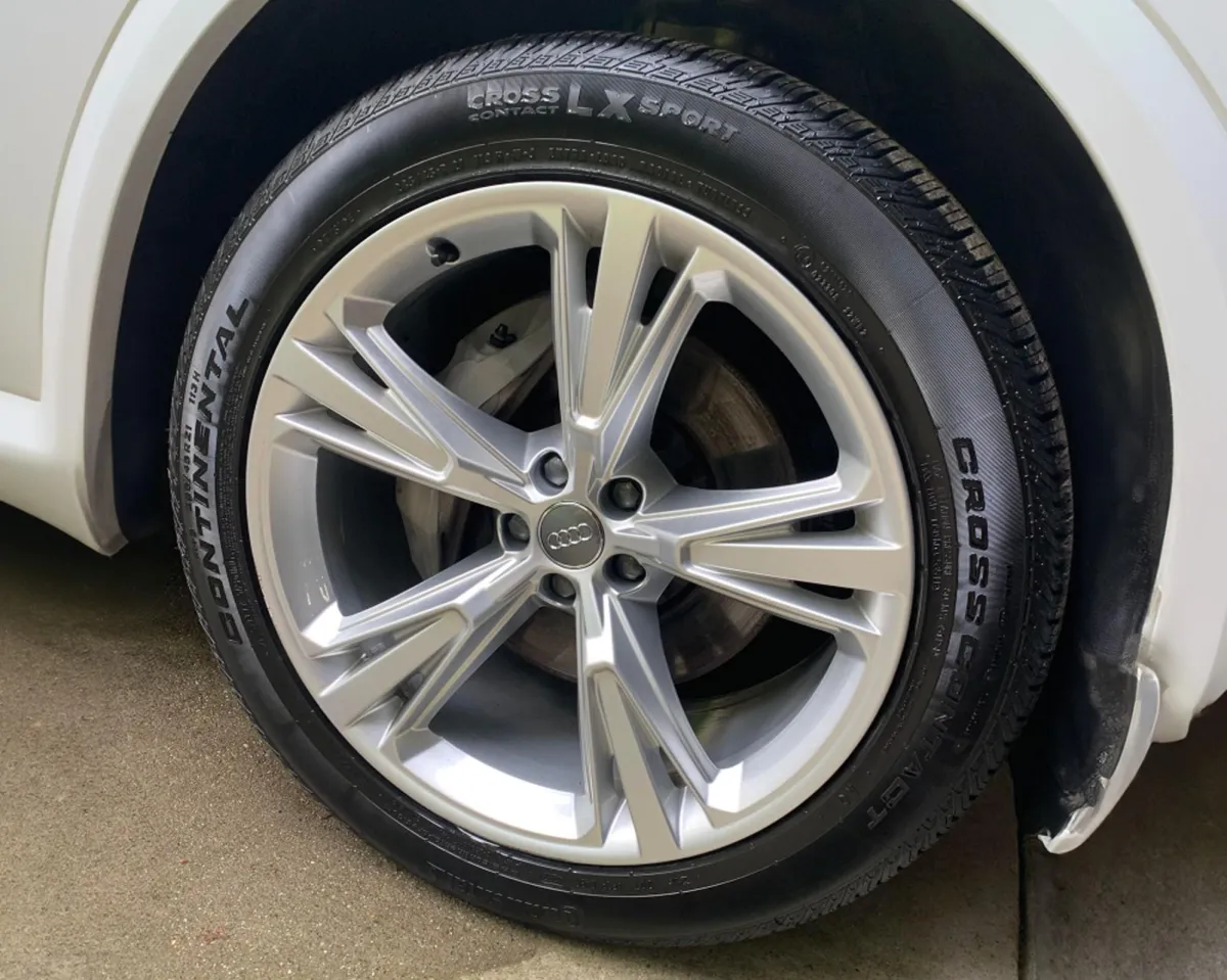 Audi wheel after being detailed.