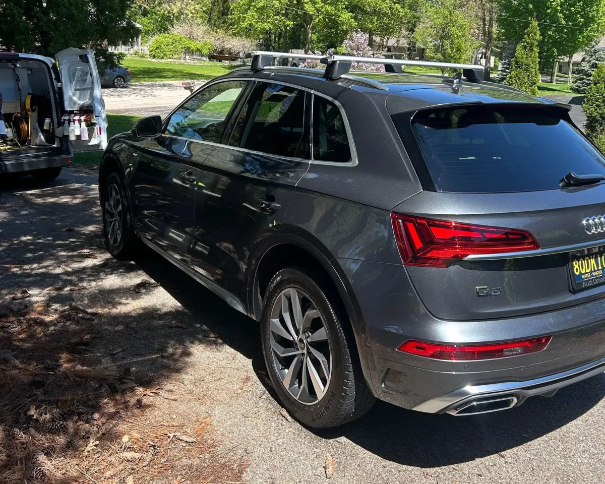 Grey Audi SUV with a standard detail.