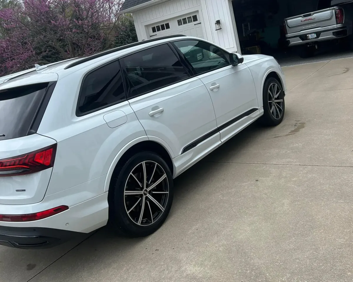 White Audi SUV with a clay and seal done to it.