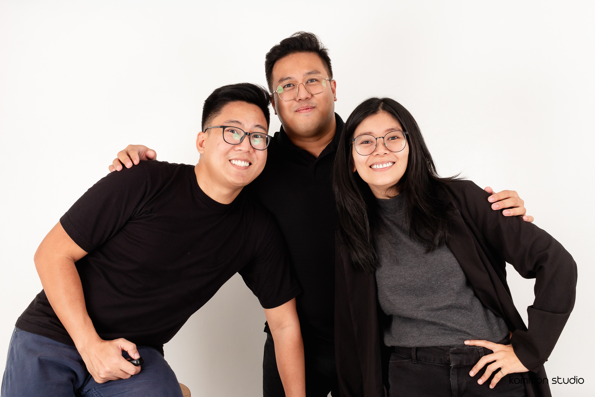 A friendly support representative with a headset, smiling at a desk with a notepad and coffee mug, in a cozy office with soft lighting and plants. The image conveys approachability and readiness to assist small business clients.