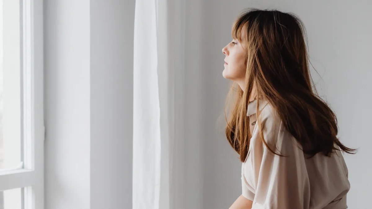 Woman relaxing and reducing stress representing nervous system health supported by chiropractic care in O’Fallon MO