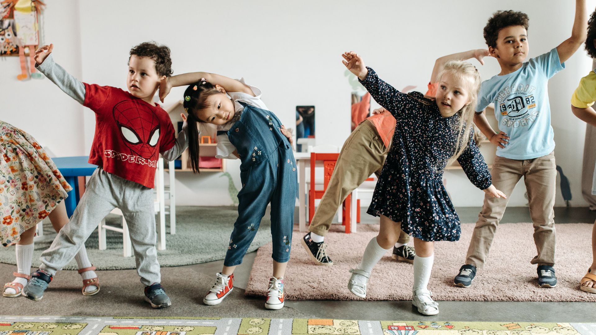 children stretching with exercises to help with muscle pain in O'Fallon MO