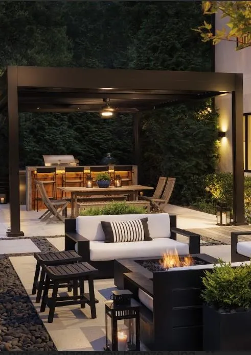 beautiful  nighttime photo of outdoor living space with a  Motorized Louver Pergola.  